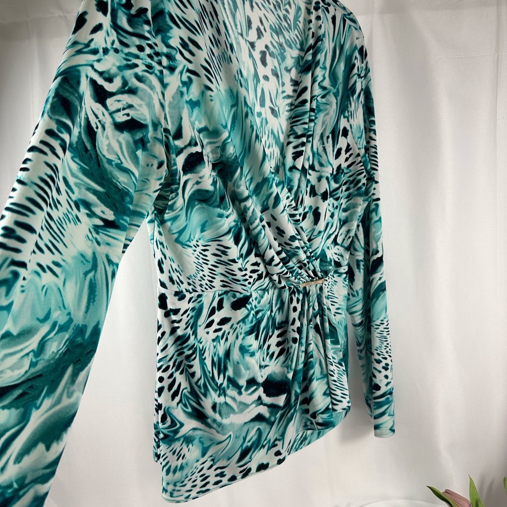 Jennifer Lopez, teal leopard print-ish size large